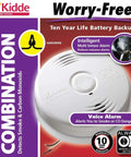 Dual Hazard Smoke And Carbon Monoxide Detector With Voice Warning Hardwired Setup And Ten Year Sealed Lithium Battery Backup Interconnectable Network Built Tough For Zero Drama Family Safety White on packaging with alarms details.