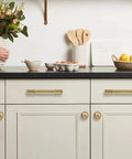 Kitchen with 10 Pack Brushed Brass Cabinet Pulls 5 Inch With 128MM Hole Centers Slick Gold Kitchen Cabinet Handles installed.
