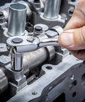 Using 43 Piece 1/4 Inch Drive SAE and Metric Socket Set with Ratchet Quick Release 72-Tooth on engine component