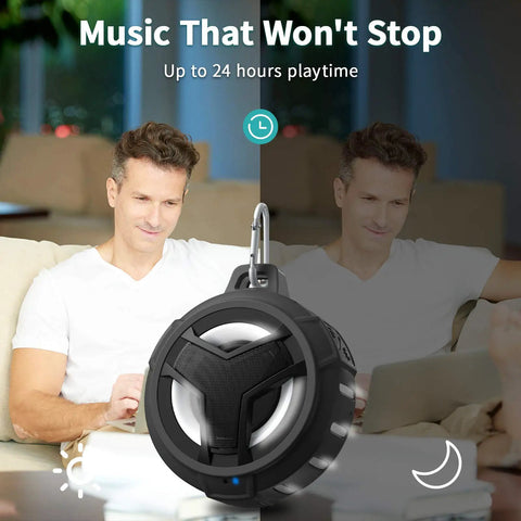 Bluetooth Shower Speaker With LED Light, IP67 Waterproof And Floating, 2000mAh Battery shown near laptop with person relaxing
