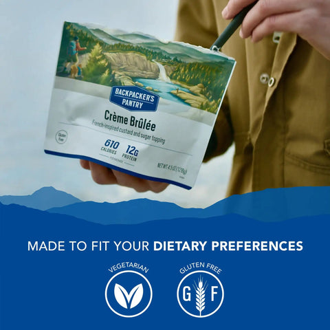 Person holding package of Creme Brulee Freeze Dried Backpacking Meal For Camping And Hiking Emergency Food With 12g Protein Vegetarian