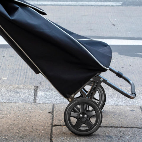 Side view of a cart with Two Pcs 6.10 Inch Laundry Cart Wheels Rolling Caster Replacement For Foldable Shopping Trolley And Grocery Cart.