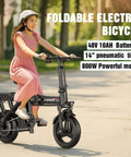Woman riding Electric Folding Bike For Adults And Teens With 800W Peak Motor 22 MPH Top Speed 30 Mile Range on street