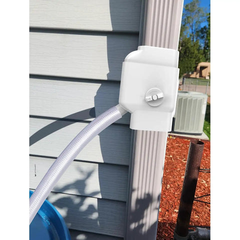 Universal Gutter Downspout Diverter With Built In Filter Screen White Fits 2x3 And Oversize 3x4 Downspouts Reversible Spout For Left Or Right Install Easy No Fuss Setup installed on white downspout with hose