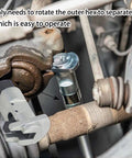 Suspension Strut Spreader Tool For Car Shocks And Wheel Bearings in use, showing easy turn operation to pry open gaps