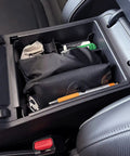 Hyundai Tucson Center Console Organizer Tray in-use, showing expanded organized storage for Limited and Hybrid models 2022-2024.