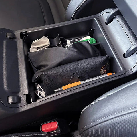 Hyundai Tucson Center Console Organizer Tray in-use, showing expanded organized storage for Limited and Hybrid models 2022-2024.