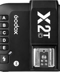 Canon TTL Wireless Flash Trigger With Bluetooth App Control for off camera shooting, detailed view of buttons and hotshoe.