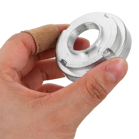 Hand holding part of 7 Pack Mini Dirt Bike Steering Shaft Bearings Kit for Off Road Rides, Beefed Up Performance Steering Bushings
