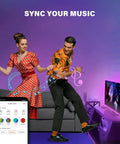 Couple dancing with Smart TV LED Backlights for 45-75 Inch TVs Eight Segment RGB Light Strips Music Sync feature, app displayed.