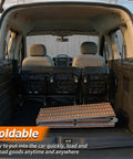 Foldable Manual Gravity-Powered Conveyor Roller System Portable 15 Inch Wide By 78 Inch Long stored in a vehicle trunk