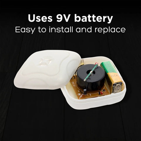 Interior of 8 Pack Water Leak Detectors 95 Decibel Flood Alarm Sensor Kit For Bathrooms Basements Laundry Rooms Garages Attics And Kitchens With Easy Placement Battery Powered Alerts And Instant Leak Detection Anywhere In Your Home showing 9V battery compartment.