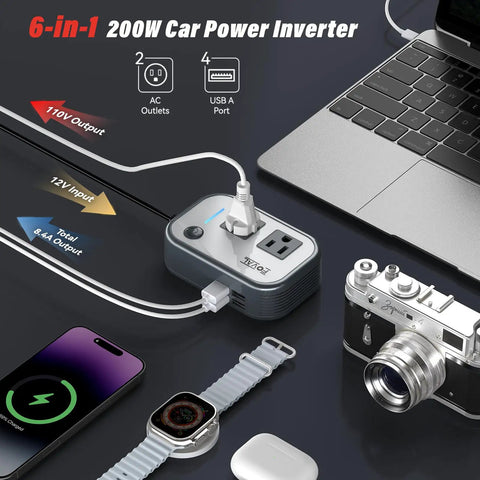 Heavy Duty 200W Car Power Inverter With Four USB Ports And AC Outlet Plug for laptops, phones, and CPAP machines on a table.