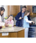Family in kitchen using Under Cabinet Power Distribution Box Slim Fit White Metal For TV DVD And Security Systems