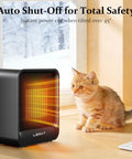 Compact 1200W PTC Ceramic Space Heater For Indoor Use Crazy Fast Heat Desk Warmer with kitten by window