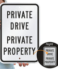 Heavy Duty Reflective Aluminum Sign For Private Drives And Home Grounds Tough As Nails Weatherproof Outdoor Marker, person holding sign.