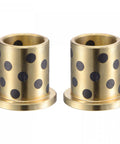 Rock Solid Flanged Sleeve Bearings At 16mm Bore With 20mm Od Measuring 25mm Long showing brass bushings with black dots.