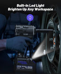 Beefy 600 Nm Half Inch Cordless Impact Wrench Kit With Two 4Ah Batteries used to tighten a car wheel lug nut, LED light on.
