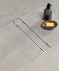 36 Inch Linear Shower Drain With Removable Wave Pattern Grate, Matte Black 304 Stainless Steel Floor Drain in tiled floor