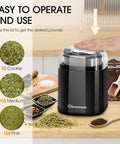 Close-up of 200W Electric Herb Grinder With Stainless Steel Blade in use, grinding herbs to varying textures on a kitchen counter