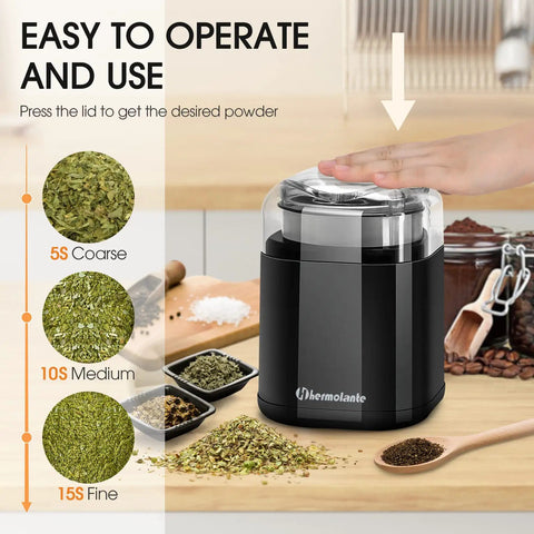 Close-up of 200W Electric Herb Grinder With Stainless Steel Blade in use, grinding herbs to varying textures on a kitchen counter