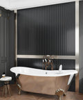 Hella Sleek Black Metallic Stripe Wall Panels With Self Adhesive Backing and Sound Absorbing Foam in elegant bathroom with tub.