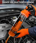 No Sweat 500 Cc Manual Fluid Extractor Pump With Long Hose For Dead Simple Oil Removal, held above engine.