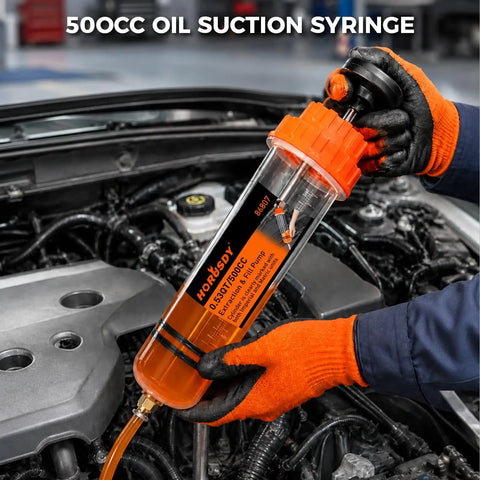 No Sweat 500 Cc Manual Fluid Extractor Pump With Long Hose For Dead Simple Oil Removal, held above engine.