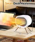 Portable 1000W Ceramic Space Heater For Home And Office With 3 Modes showing airflow on desk with wood grain legs