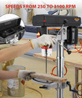 Person using Beast 13 Inch Benchtop Drill Press With 7.5 Amp 120V Motor, Variable Speed 288-3084 RPM, Cast Iron Frame, 0-45 Degree Tilting Table for wood drilling