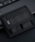 Durable Camera Battery Pouch Case For 2 Batteries With Zipped Card Pocket on laptop
