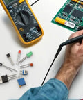 Person using DIY Electronics Component Kit With 1818 Pieces Including Resistors, Capacitors, LEDs, Diodes, Transistors, and PCB Board