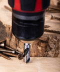 Drilling wood with a bit from Stubby HSS Brad Point Drill Bit Set With One Quarter Inch Hex Shank For Carpenter Woodworking Seven Piece Pro Grade Bits SAE Sizes From One Sixteenth To Three Eighths Inch