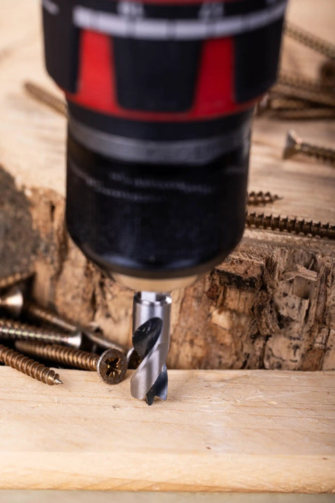 Drilling wood with a bit from Stubby HSS Brad Point Drill Bit Set With One Quarter Inch Hex Shank For Carpenter Woodworking Seven Piece Pro Grade Bits SAE Sizes From One Sixteenth To Three Eighths Inch