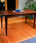 Heavy Duty Twenty Eight Inch Wood Table Extension Slides Packing Slick Rack And Pinion Action For Dead Smooth One Handed Leaf Movement And Zero Sweat Furniture Upgrade Projects on a wooden dining table.