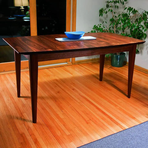 Heavy Duty Twenty Eight Inch Wood Table Extension Slides Packing Slick Rack And Pinion Action For Dead Smooth One Handed Leaf Movement And Zero Sweat Furniture Upgrade Projects on a wooden dining table.