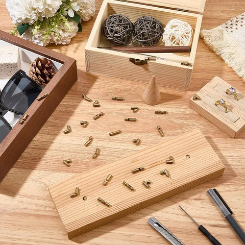 Hidden Brass Barrel Hinges 5mm Set Of 30 Pcs, 180 Degree Opening, on wooden surface with tools and decorative boxes