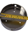 Drilax 4-1/2-inch diamond hole saw with guide; circular metal body with diamond edge and mounting holes, front view.