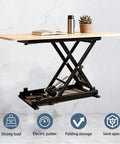 Top Shelf Electric Scissor Lift Table With Foldable Design And Wireless Remote Control showing a compact design with book and plant.