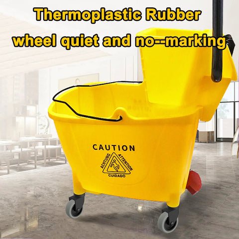Thermoplastic Rubber 3-inch wheels on Rubbermaid WaveBrake bucket with caution sign in commercial setting.