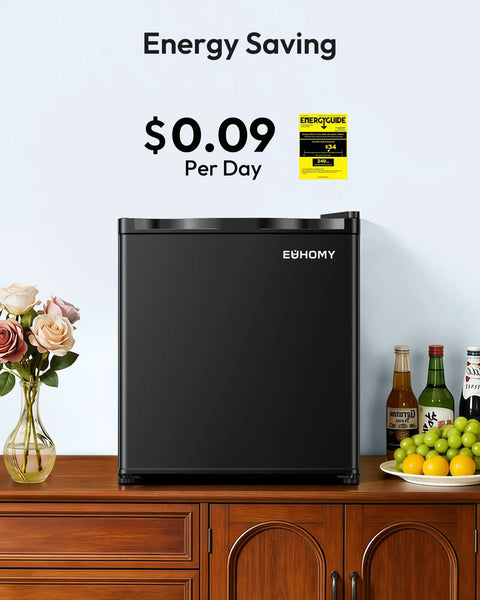 Compact One Point One Cubic Foot Upright Mini Freezer With Reversible Door And Adjustable Feet Hella Efficient Black cold storage on wooden cabinet.