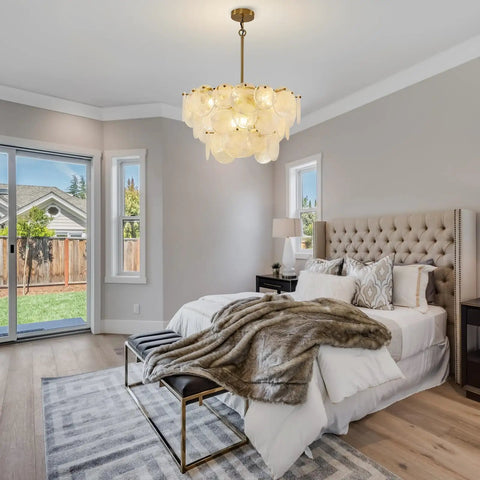 23 Inch 9 Light Gold Glass Chandelier 3 Tier Round Crystal Pendant Light Height Adjustable For Dining Room Foyer Living Room, stylishly illuminating a modern bedroom.