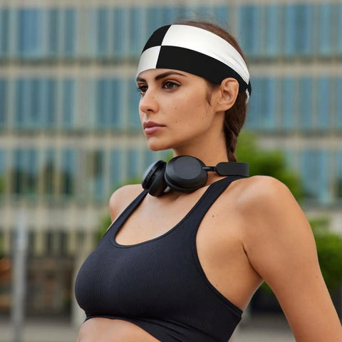 Black And White Piano Grid Print Stretchy Headbands Sweat Wicking And Ultra Breathable Workout Band worn outdoors by a fitness enthusiast.