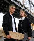 Get Ready To Crush It With This Cool Fqrentyu Breathable Cycling Cap For Men And Women on two young skaters holding boards.
