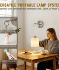 Peel and Stick Sconces Set of 2 Brushed Nickel,Detachable Battery Operated Wall Sconce With 10000mah Rechargeable Bulbs,12 RGB Battery Sconce With Remote,Renter Friendly Wall Lamps for Bedroom,Hallway shown in use on a table with dessert.