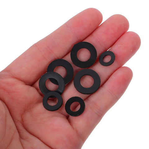 Heavy Duty Plastic Washer Assortment Kit For Bolts And Screws With Cushioning And Wear Resistance Black Flat Washers For Home Repair And Electrical Outlet Spacers High Temperature Safe And Durable, assorted sizes in hand