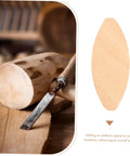 100 Piece Real Deal Hardwood Joiner Biscuits For Woodworking close-up on a smooth biscuit with a chisel and wood log.