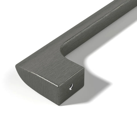 Close-up of a gun metal 10-inch center cabinet handle from the Etna Collection, showing solid stainless construction and screw hole.