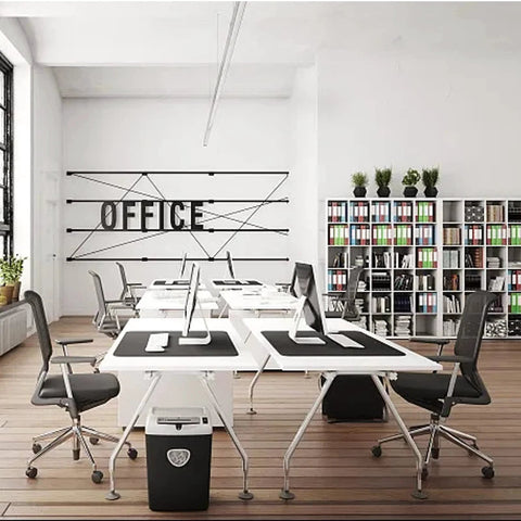 Modern office space with desks and chairs on M8x125 Threaded Stem One Point Five Inch Nylon Swivel Caster Wheels With Brake For Floor Protection.