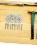 Four Pack Heavy Duty Wall Mount Gate Hinges With Included Mounting Screws on a wooden surface with screws and tools.